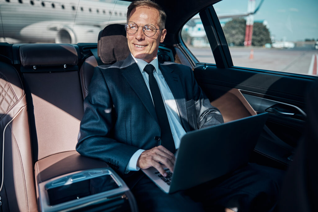 business man in chauffeur car